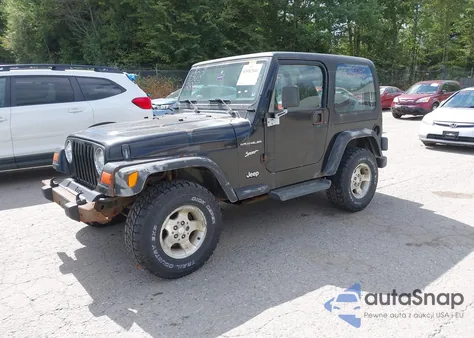 2002 Jeep Wrangler Sport z USA, uszkodzony, nr VIN 1J4FA49S82P704731